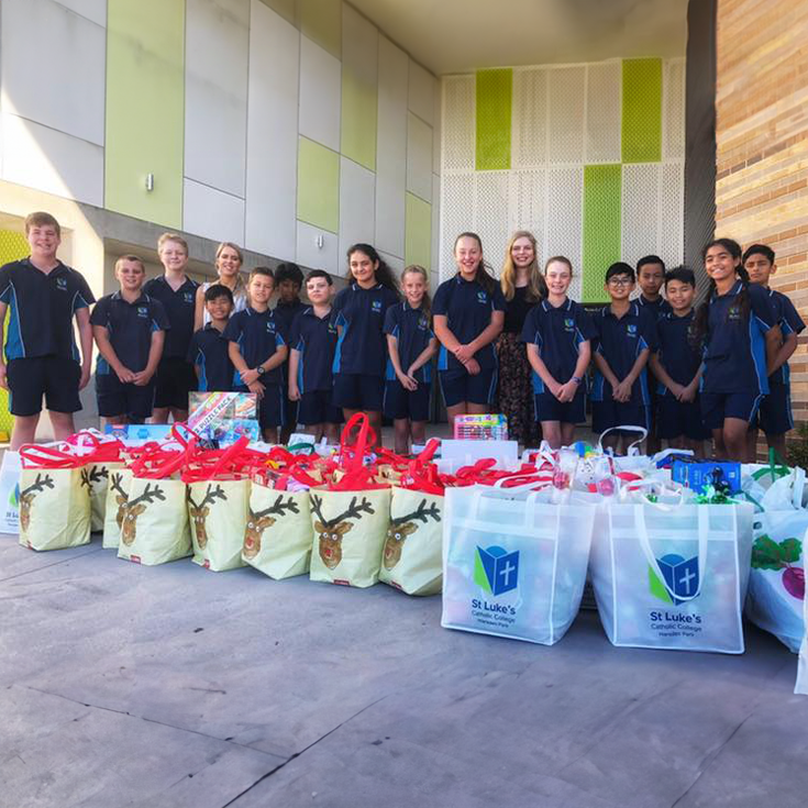St Luke's Catholic School Marsden Park students donating to St Vincent de Paul